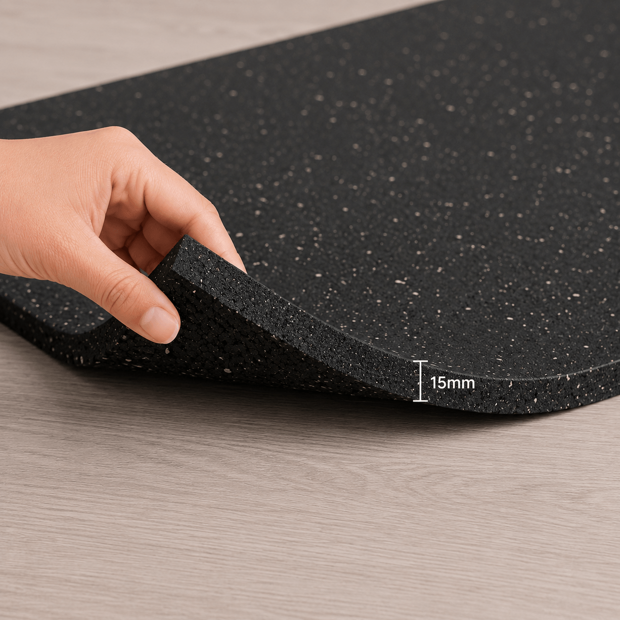 Close up of the 15mm thick speckled rubber gym mat